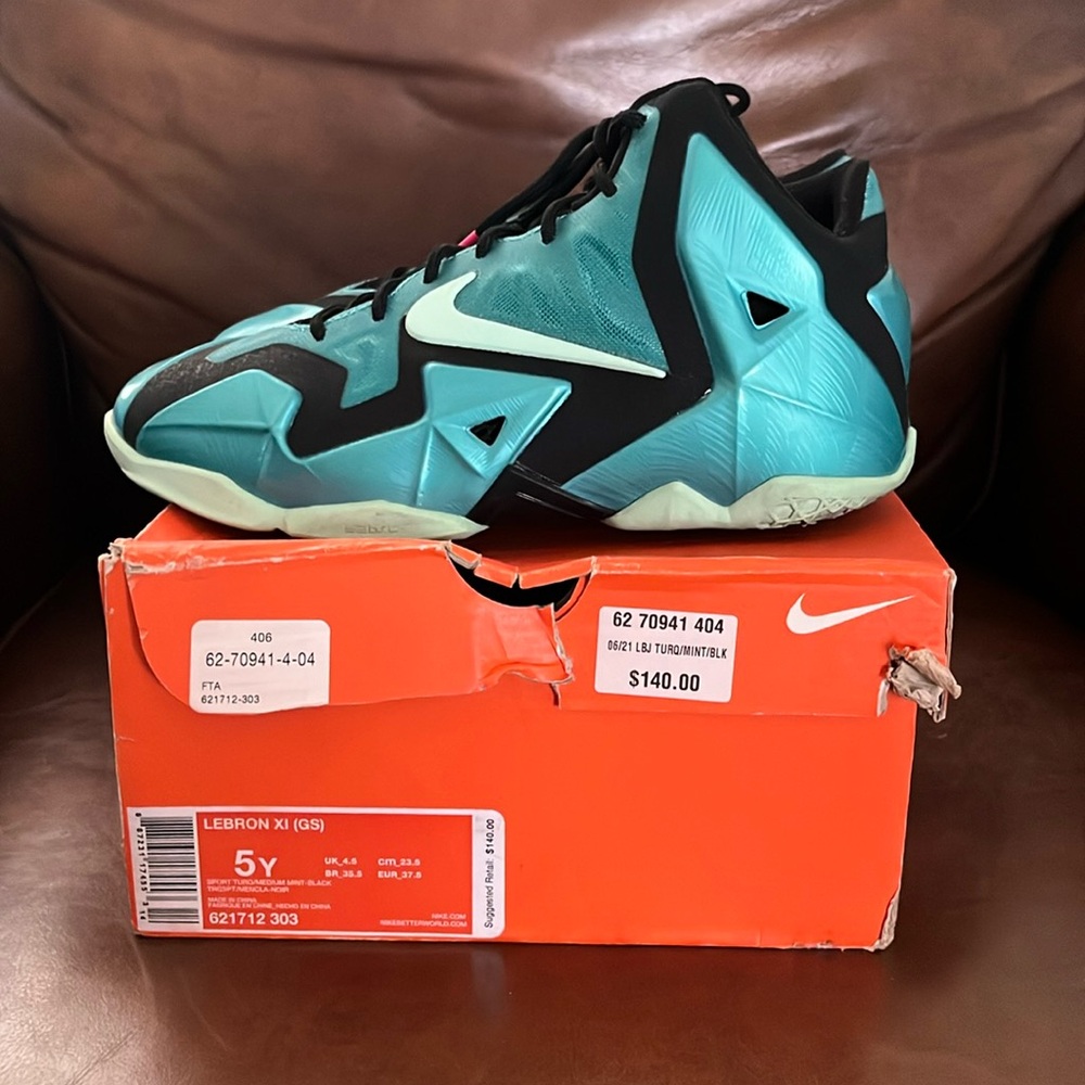 LeBron XI (GS) kid size sneakers.